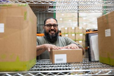 person handling a Taoglas product order