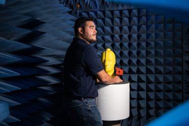 Taoglas Employee in a blue chamber used for Custom IoT Solutions