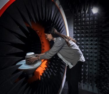 Person working with a Antenna in Taoglas Antenna Chamber